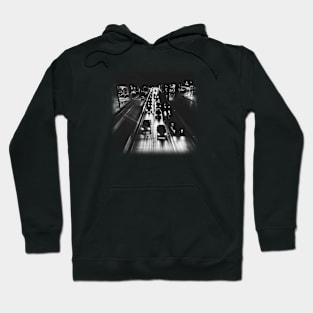 A black photo of cars on a highway at night. Hoodie